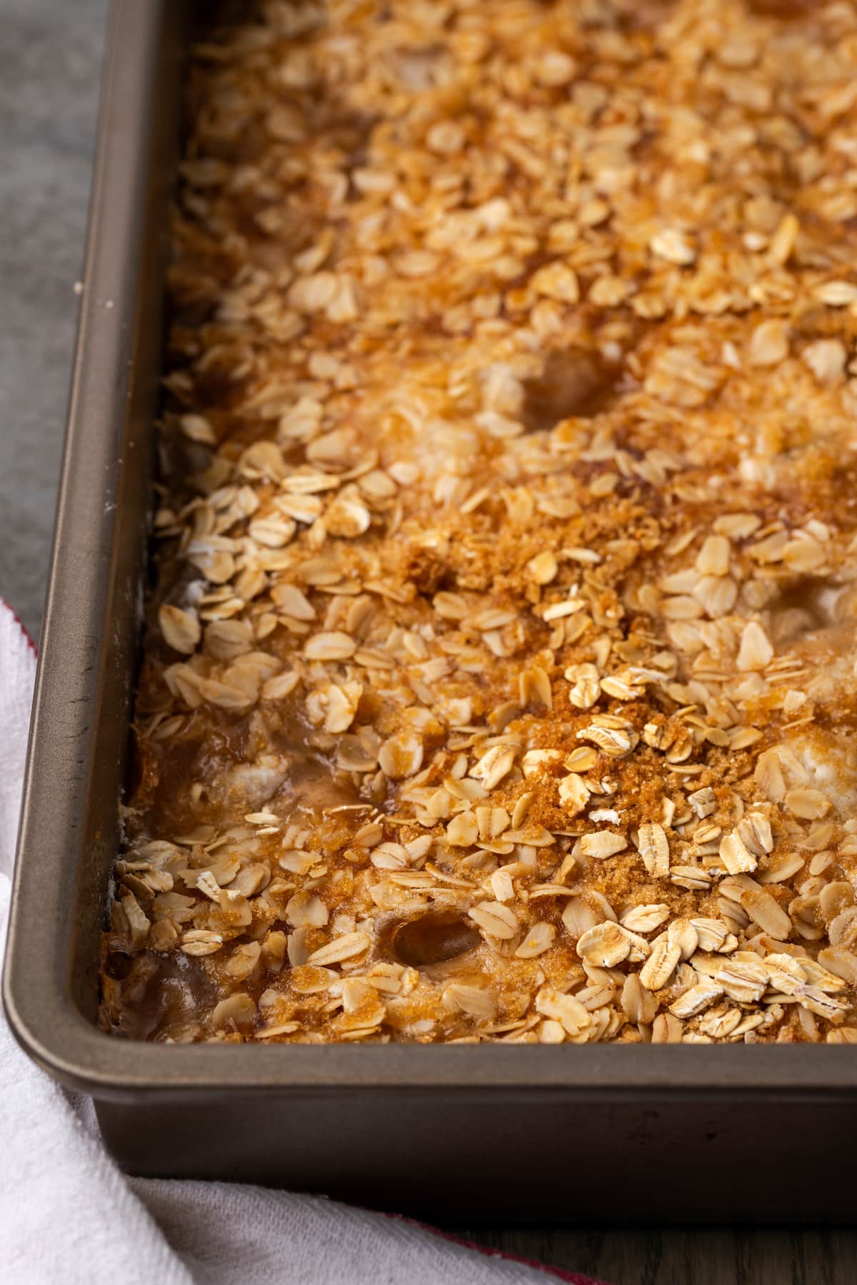 Apple dump cake in a baking pan.