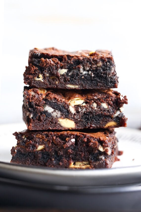 Bombshell Oreo Brownies stacked on a plate