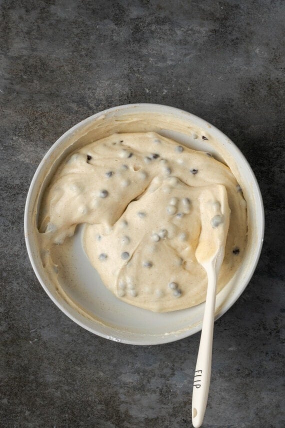 Cannoli topping in a bowl with a spatula.