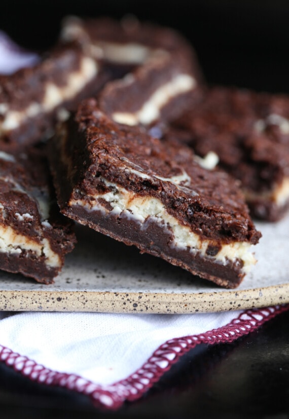 Cheesecake Brownies on a Speckled Serving Platter