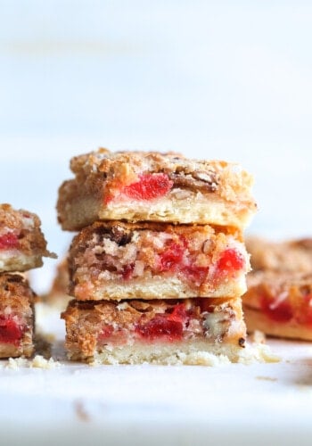 Stacked Cherry Coconut Bars with shortbread crust