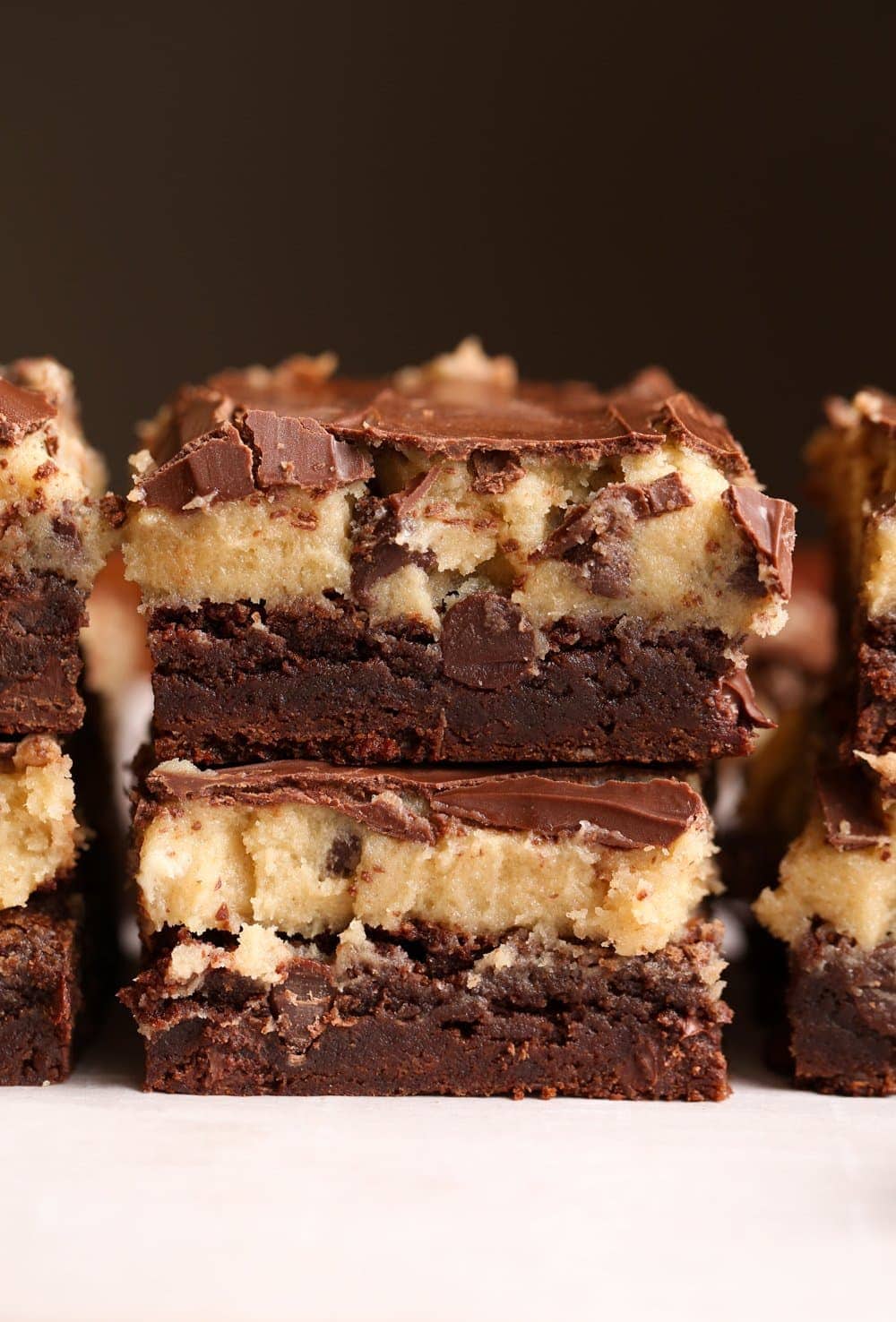 Cookie Dough Brownies stacked on a plate