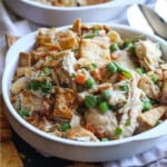 Chicken Pot Pie made in a Crock Pot served in a bowl with pie crust