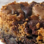 A super close-up shot of a baked brookie with cookie dough in the center