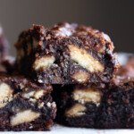 Stacked Pecan Pie Brownies on parchment paper