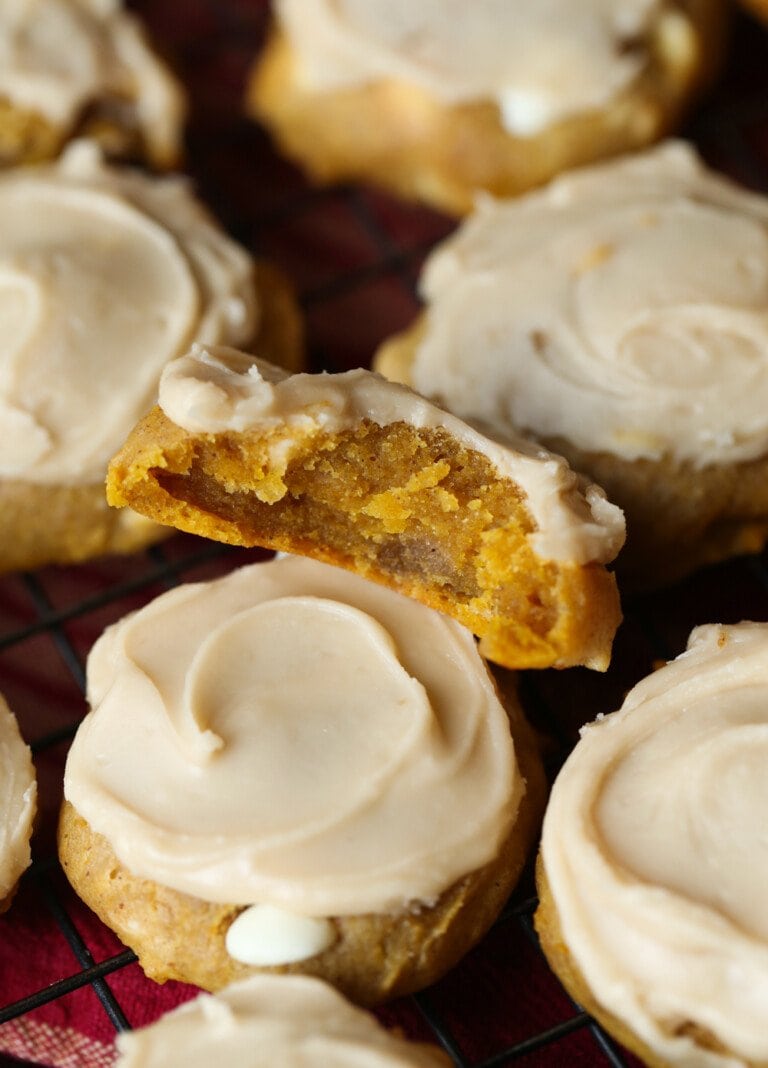 Pumpkin Cookie broken in half and stacked on another cookie.