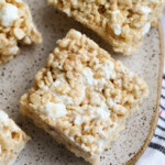 Pumpkin Spice Krispie Treats on a plate from above showing gooey marshmallow