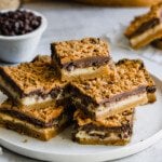 Plate of stacked chocolate cookie bars.